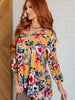 V-Neck Scoop Hem Top in Marigold Floral